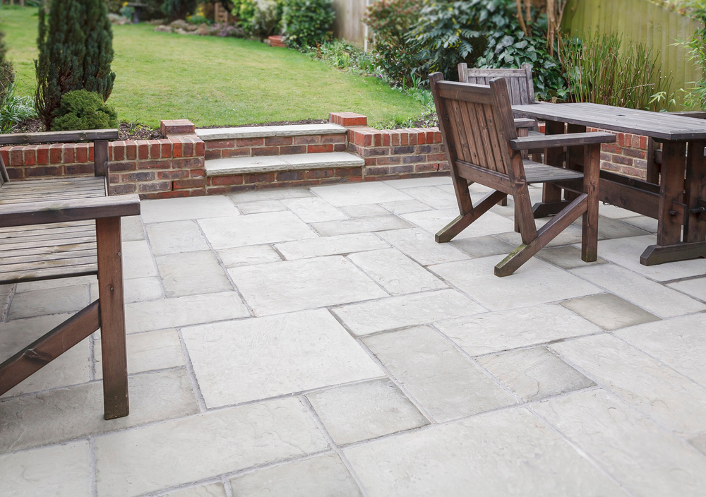 New flagstone patio and backyard, outdoor garden patio with furniture, UK